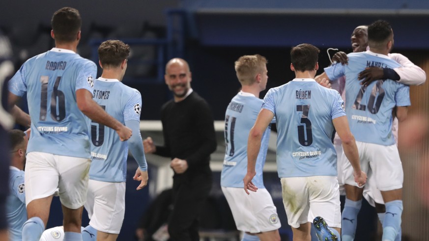 Manchester City's Riyad Mahrez celebrates with teammates after scoring his sides second goal during the Champions League semifinal first leg soccer match between Paris Saint Germain and Manchester Cit ...