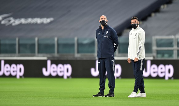 epa08721253 Staff at the Juventus Stadium prior to the Italian Serie A soccer match Juventus FC vs SSC Napoli in Turin, Italy, 04 October 2020. After 45 minutes, as governed by the regulation, with re ...
