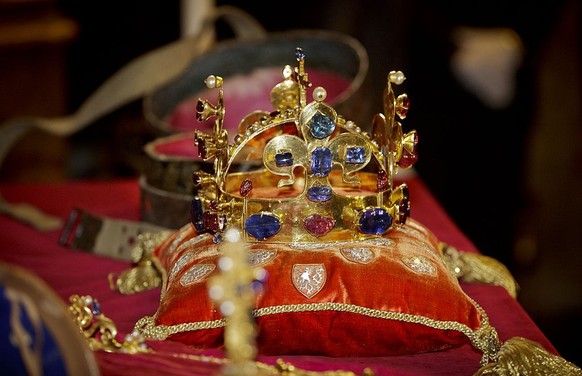 PRAGUE, CZECH REPUBLIC - MAY 09: The crown of Saint Wenceslas of Bohemia is displayed before the opening of The Bohemian Crown Jewels Exhibition 2013 on May 09, 2013 in Prague, Czech Republic.  The Czech...