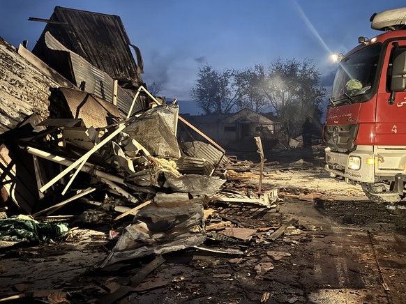 epa12826324 Firefighters work at the scene of alleged Pakistani airstrikes in Kabul, Afghanistan, 17 March 2026. Afghan authorities alleged that Pakistani strikes targeted a drug addiction treatment f ...