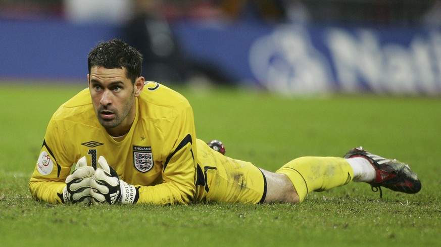 England goalkeeper Scott Carson lies on the pitch during the Euro 2008 group E qualifying soccer match between England and Croatia at Wembley Stadium in London, Wednesday Nov. 21, 2007. England were b ...