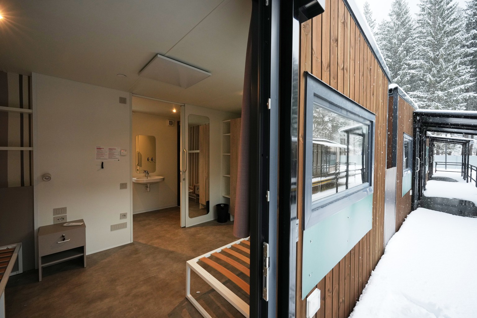 A view of the interior of one of the trailer homes at the athlete's village for the Cortina Milan Winter Olympics, in Cortina D'Ampezzo, Italy, Monday, Nov. 24, 2025. (AP Photo/Andrew Medich ...