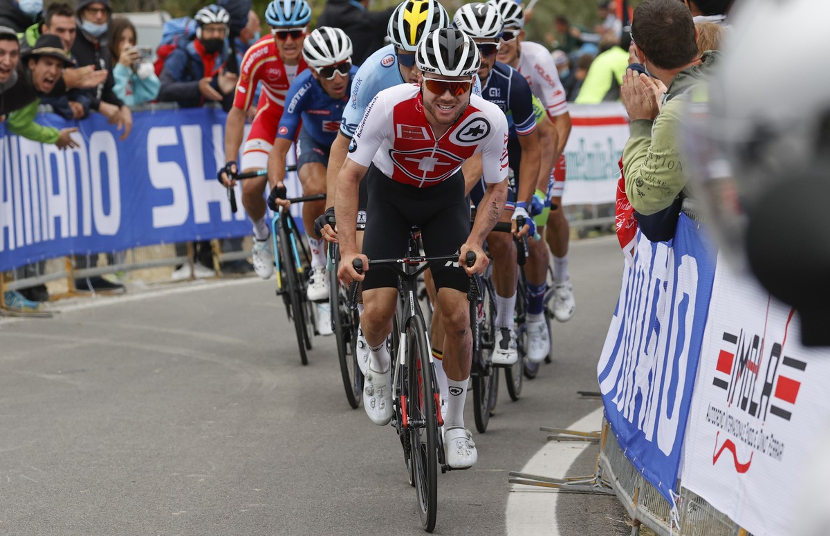 Switzerland's Marc Hirschi leads during the men's elite event, at the road cycling World Championships, in Imola, Italy, Sunday, Sept. 27, 2020. (Luca Bettini/Pool Photo via AP)