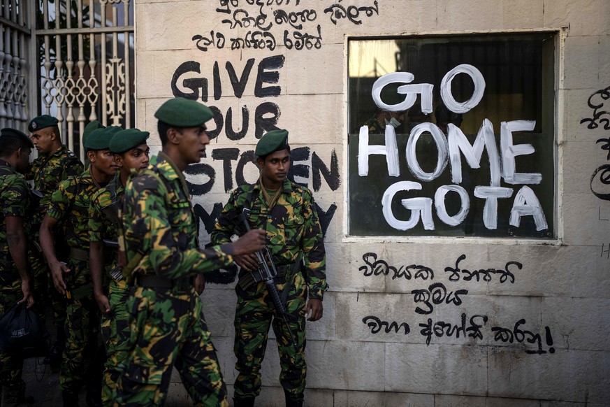 Sri Lanka army soldiers patrol near the official residence of president Gotabaya Rajapaksa three days after it was stormed by anti government protesters in Colombo in Colombo, Sri Lanka, Tuesday, July ...