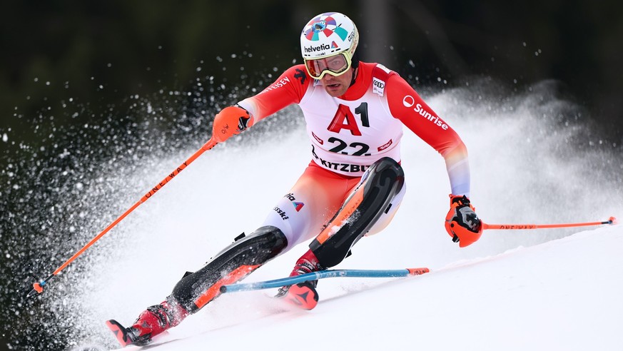 epa12679493 Daniel Yule of Switzerland in action in the first run of the Men's Slalom race at the FIS Alpine Skiing World Cup in Kitzbuehel, Austria, 25 January 2026. EPA/ANNA SZILAGYI