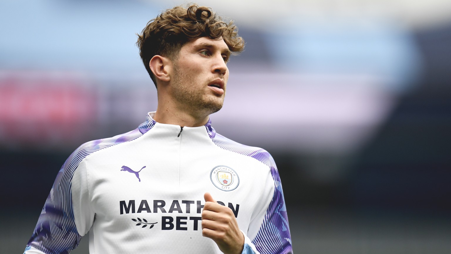 epa08547784 John Stones of Manchester City during the warm-up before English Premier League match between Manchester City and AFC Bournemouth in Manchester, Britain, 15 July 2020. EPA/Peter Powell/NMC ...