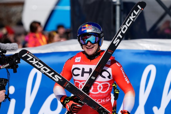 Switzerland's Marco Odermatt reacts at the finish area, during a men's World Cup downhill race, in Garmisch Partenkirchen , Germany, Saturday, Feb. 28, 2026. (AP Photo/Giovanni Auletta)
Marc ...