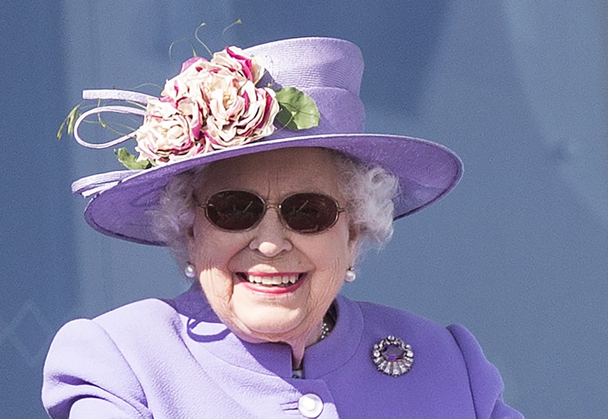 epa06793850 (FILE) - Britain&#039;s Queen Elizabeth II reacts during the derby at Epsom Downs racecourse in Surrey, Britain, 02 June 2018 (reissued 08 June). According to the Buckingham Palace the Que ...