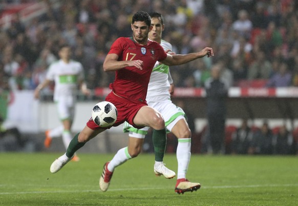 Portugal&#039;s Goncalo Guedes scores the opening goal during a friendly soccer match between Portugal and Algeria in Lisbon, Portugal, Thursday, June 7, 2018. (AP Photo/Armando Franca)