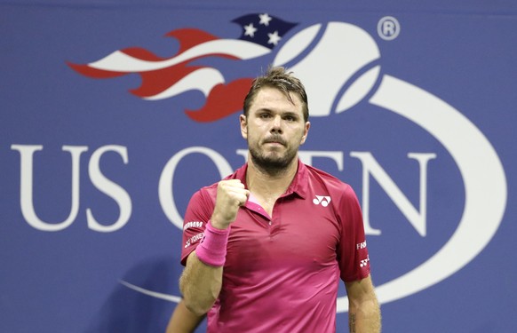 Stan Wawrinka, of Switzerland, reacts after winning the first set against Juan Martin del Potro, of Argentina, during the quarterfinals of the U.S. Open tennis tournament, Wednesday, Sept. 7, 2016, in ...