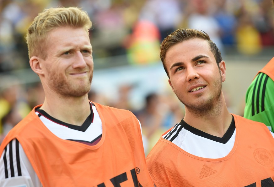 epa05436407 (FILE) A file picture dated 04 July 2014 shows Germany's Andre Schuerrle (L) and Mario Goetze (R) before the FIFA World Cup 2014 quarter final soccer match between France and Germany ...