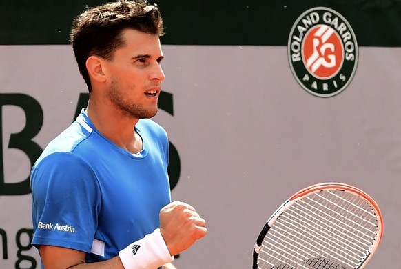 epa07622700 Dominic Thiem of Austria reacts as he plays Gael Monfils of France during their menâs round of 16 match during the French Open tennis tournament at Roland Garros in Paris, France, 03 Jun ...