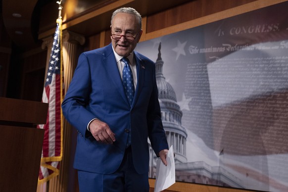epa10110701 Senate Majority Leader Chuck Schumer concludes a news conference after the Senate passed the Inflation Reduction Act during a marathon voting session known as a 'vote-a-rama', on Capitol H ...