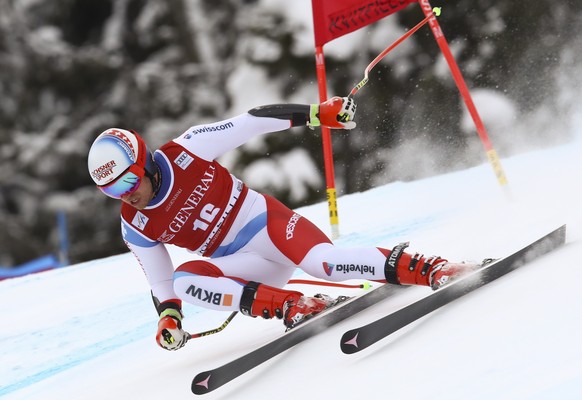 Switzerland&#039;s Mauro Caviezel speeds down the course during an alpine ski, men&#039;s World Cup super-G, in Kvitfjell, Norway, Sunday, March 11, 2018. (AP Photo/Alessandro Trovati)