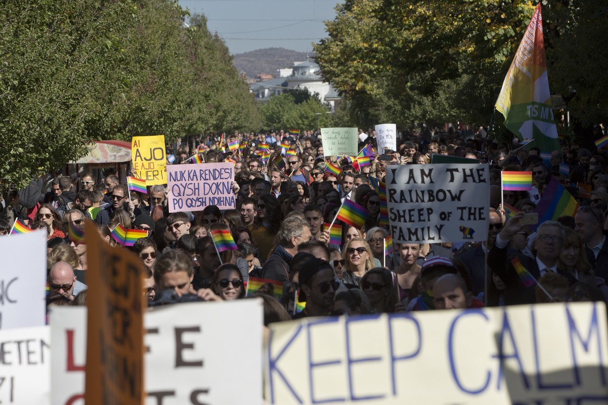 LGBT rights groups and supporters of the community hold banners during the country's first Gay Pride parade on Tuesday Oct. 10, 2017, in Kosovo's capital Pristina. (AP Photo/Visar Kryeziu)