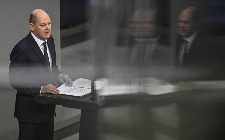 epa10498376 German Chancellor Olaf Scholz delivers a statement &#039;A Year of Changing Times - Strengthening Germany&#039;s Security and Alliances, Continuing to Support Ukraine&#039; at the German p ...