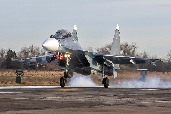 In this photo taken from video provided by the Russian Defense Ministry Press Service on Monday, Jan. 31, 2022, Russian Su-30SM2 fighter jet takes off from the airfield in Chernyakhovsk, Russia. Four  ...