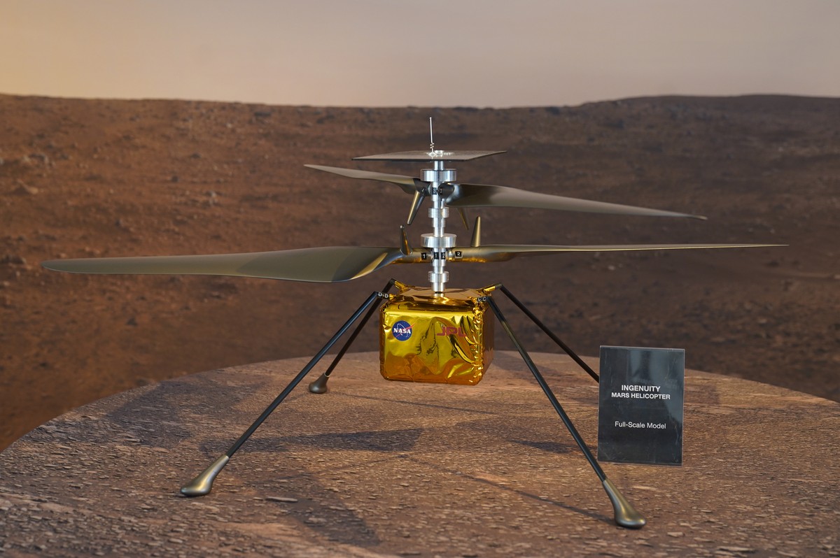 FILE - This Wednesday, Feb. 17, 2021 file photo shows a full-scale model of the Ingenuity helicopter displayed for the media at NASA's Jet Propulsion Laboratory in Pasadena, Calif. The 4-pound (1 ...