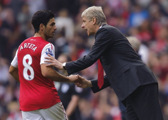 Mandatory Credit: Photo by Back Page Images/Shutterstock 1471729t Mikel Arteta receives instructions from Arsenal Manager Arsene Wenger Arsenal v Sunderland Premier League Football, Emirates Stadium,  ...