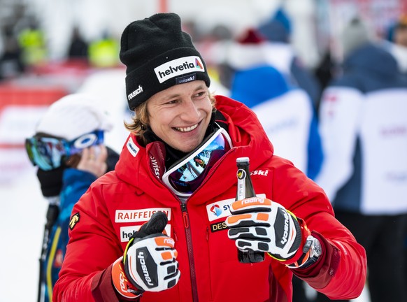 Marco Odermatt of Switzerland celebrates after the men's Giant Slalom race at the FIS Alpine Skiing World Cup finals, in Parpan-Lenzerheide, Switzerland, Saturday, March 20, 2021. (KEYSTONE/Jean-Chris ...