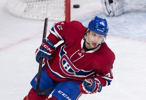 Montreal Canadiens&#039; Sven Andrighetto celebrates his goal past Carolina Hurricanes goalie Cam Ward in a shootout to win 2-1 an NHL hockey game Sunday, Feb. 7, 2016, in Montreal. (Paul Chiasson/The ...