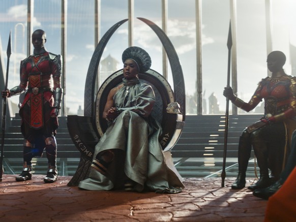 This image released by Marvel Studios shows, from left, Dorothy Steel as Merchant Tribe Elder, Florence Kasumba as Ayo, Angela Bassett as Ramonda, and Danai Gurira as Okoye in a scene from &quot;Black ...