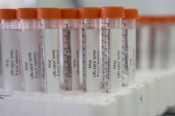 Vials containing PFAS samples sit in a tray, Wednesday, April 10, 2024, at a U.S. Environmental Protection Agency lab in Cincinnati. The Environmental Protection Agency on Wednesday announced its firs ...