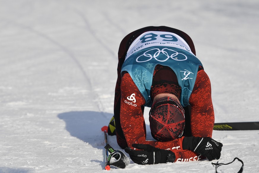 Dario Cologna of Switzerland reacts during the men Cross-Country Skiing 15 km free race in the Alpensia Biathlon Center during the XXIII Winter Olympics 2018 in Pyeongchang, South Korea, on Friday, Fe ...