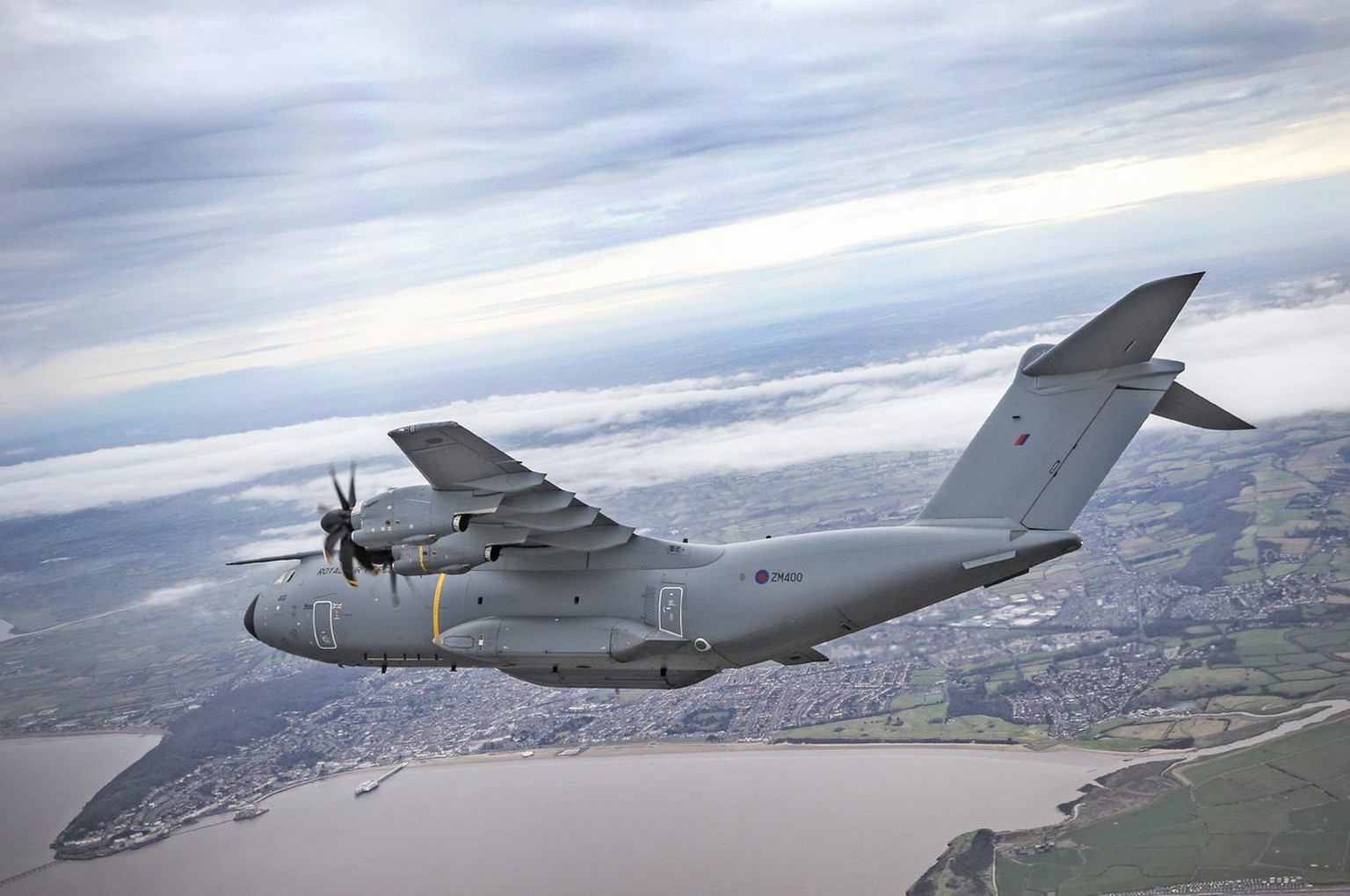 epa04611495 A photo made available 9th February 2015 by the British Ministry of Defence shows the first A400M Atlas transport plane, named City of Bristol, flying over the west English city 5 February ...