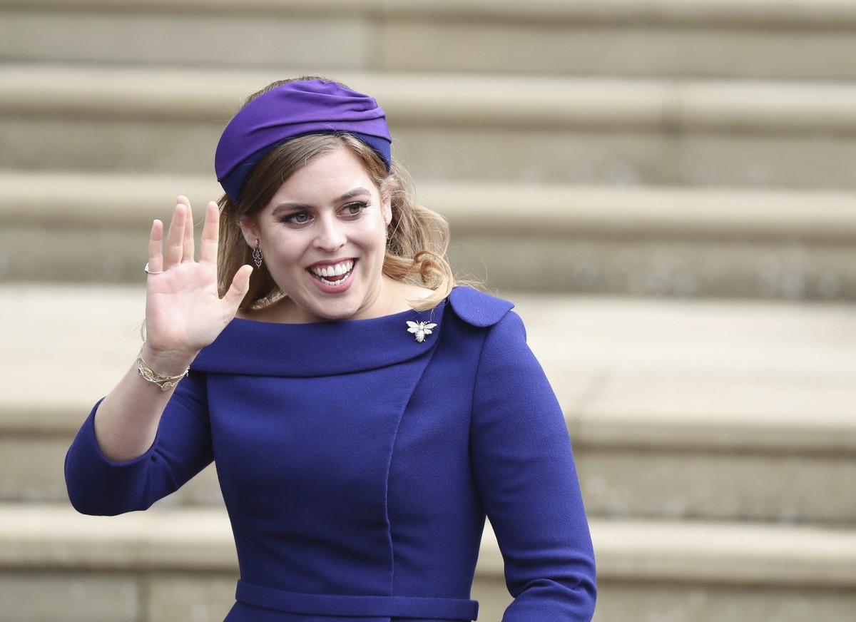 FILE - In this Friday Oct. 12, 2018 file photo, Britain's Princess Beatrice arrives for the wedding of Princess Eugenie of York and Jack Brooksbank at St George's Chapel, Windsor Castle, nea ...