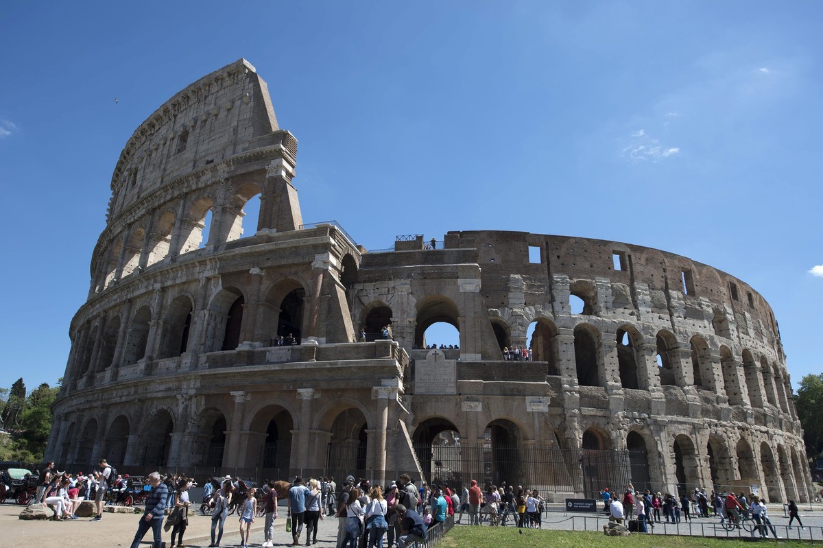 epa05260302 An exterior view of the ancient Colosseum arena, after scaffolding surrounding the building was dismantled, in Rome, Italy, 15 April 2016. The landmark Roman era Colosseum arena underwent  ...