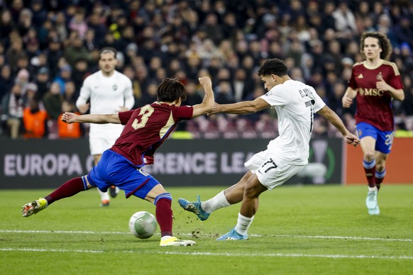 epa11156213 Servette&#039;s defender Keigo Tsunemoto, left, fights for the ball with Ludogorets&#039; forward Caio Vidal, right, during the UEFA Conference League Play Off 1st leg soccer match between ...