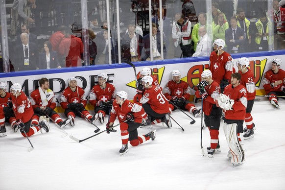 Switzerland&#039;s players look disappointed after losing agains team Sweden, during the shootout of the IIHF 2018 World Championship Gold Medal game between Sweden and Switzerland, at the Royal Arena ...