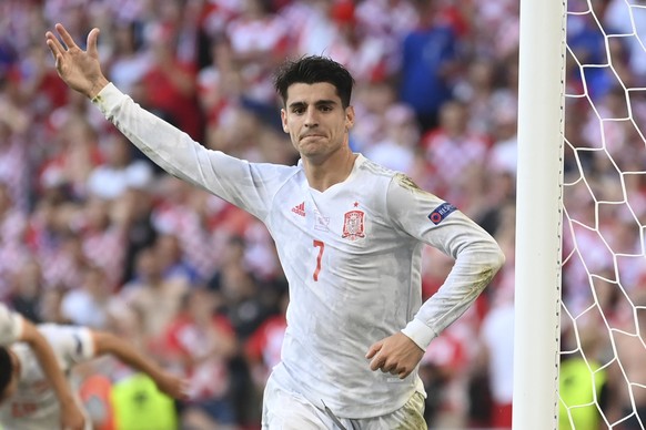 Spain's Alvaro Morata celebrates after scoring his side's fourth goal during the Euro 2020 soccer championship round of 16 match between Croatia and Spain at the Parken Stadium in Copenhagen, Monday J ...
