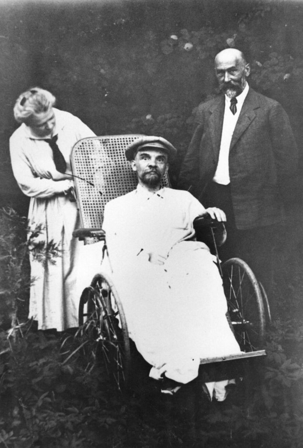 circa 1923: Russian revolutionary Vladimir Ilyich Lenin (1870 - 1924), the founder of the Bolshevik state, in an advanced state of ill health following a series of strokes. He was constantly attended  ...