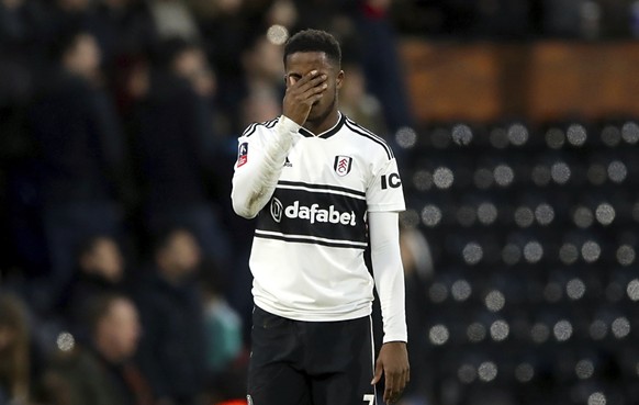 Fulham's Ryan Sessegnon shows his dejection after the final whistle of their English FA Cup, third round soccer match against Oldham Athletic at Craven Cottage, London, Sunday, Jan. 6, 2018. The FA Cu ...