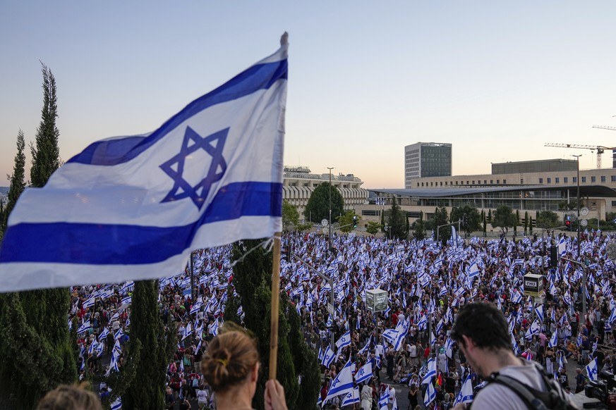 Thousands of Israelis protest against plans by Prime Minister Benjamin Netanyahu&#039;s government to overhaul the judicial system, in Jerusalem, Saturday, July 22, 2023. Thousands of demonstrators en ...