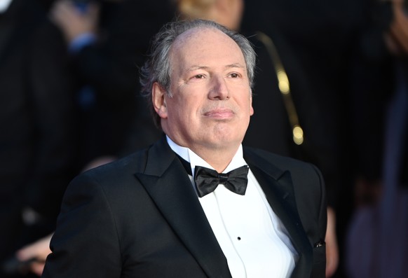 epa09494257 German film score composer Hans Zimmer poses for photographers at the world premiere of the new James Bond film 'No Time To Die' at the Royal Albert Hall in London, Britain, 28 S ...