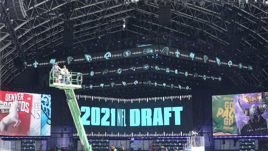 Workers continue preparing the NFL Draft Theatre for the 2021 NFL Draft, Tuesday, April 27, 2021, in Cleveland. After going all virtual in 2020 due to the COVID-19 pandemic, the three-day draft, which ...