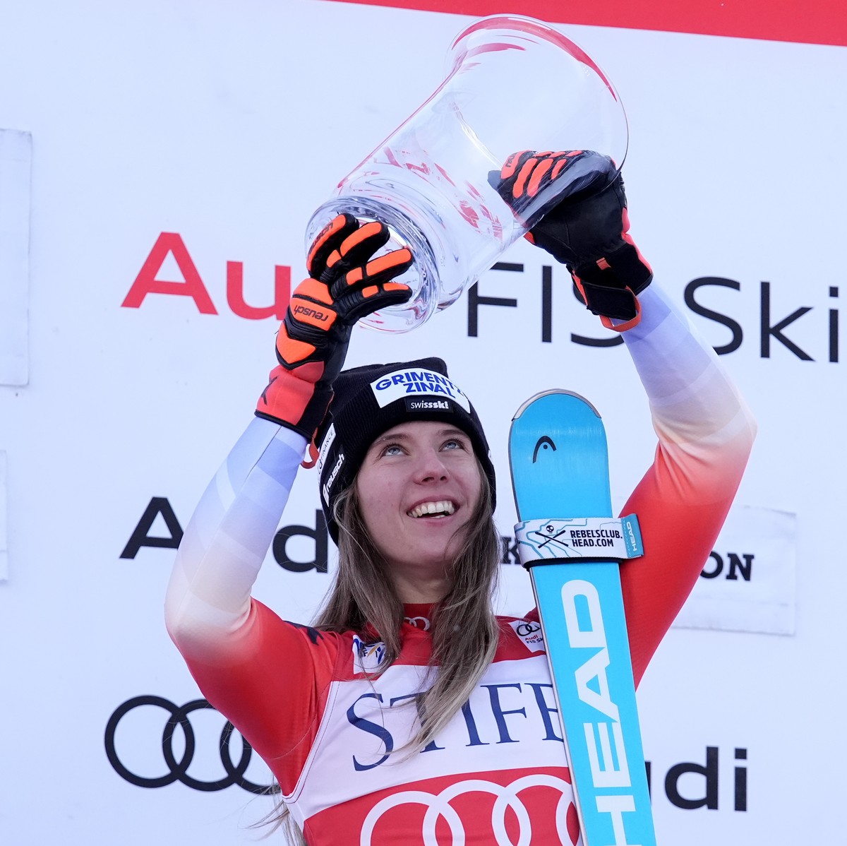 Camille Rast, of Switzerland, celebrates after her victory in a women's World Cup slalom skiing race, Sunday, Dec. 1, 2024, in Killington, Vt. (AP Photo/Robert F. Bukaty)
