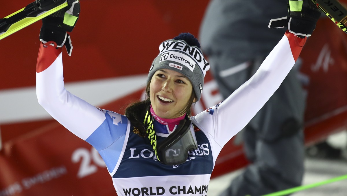 Switzerland's Wendy Holdener celebrates after winning the women's combined, at the alpine ski World Championships in Are, Sweden, Friday, Feb. 8, 2019. (AP Photo/Alessandro Trovati)