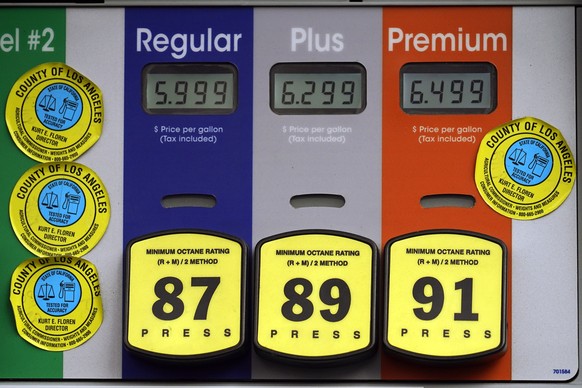 High gas prices are posted at a full service gas station in Beverly Hills, Calif., Sunday, Nov. 7, 2021. The average U.S. price of regular-grade gasoline jumped by 5 cents over the past two weeks, to  ...