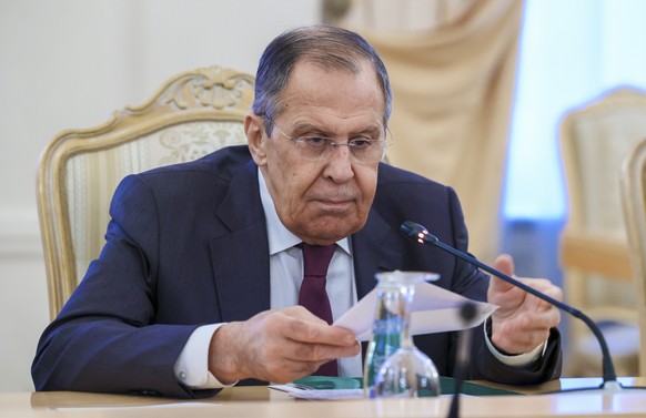 epa10417825 A handout photo made available by the Russian Foreign Ministry Press Service shows Russian Foreign Minister Sergei Lavrov speaks during his meeting with ICRC International Committee of the ...