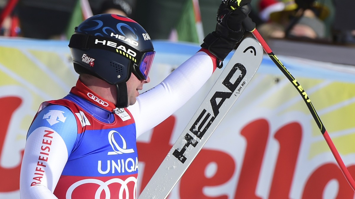 Switzerland's Beat Feuz reacts at finish line after completing an alpine ski, men's World Cup downhill, in Saalbach, Austria, Thursday, Feb. 13, 2020. (AP Photo/Marco Tacca)