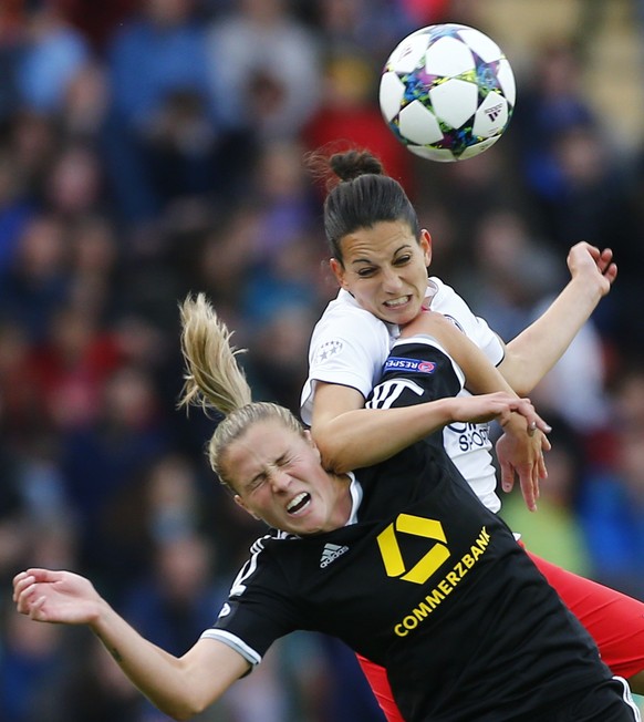 Paris St Germain&#039;s Aurelie Kaci fights for the ball with FFC Frankfurt&#039;s Ana Maria Crnogorcevic (L) during their UEFA Women&#039;s Champions League final soccer match in Berlin, Germany, May ...