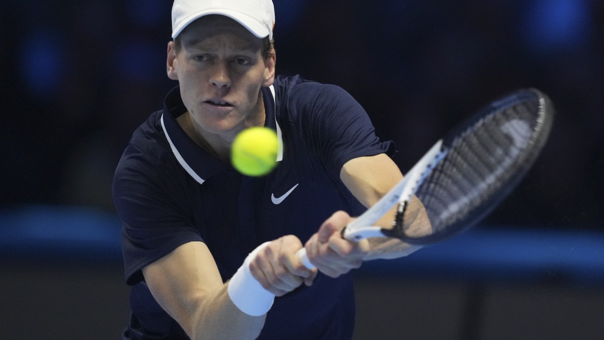 Italy's Jannik Sinner returns to Taylor Fritz of the United States during the final match of the ATP World Tour Finals at the Inalpi Arena, in Turin, Italy, Sunday, Nov. 17, 2024. (AP Photo/Anton ...