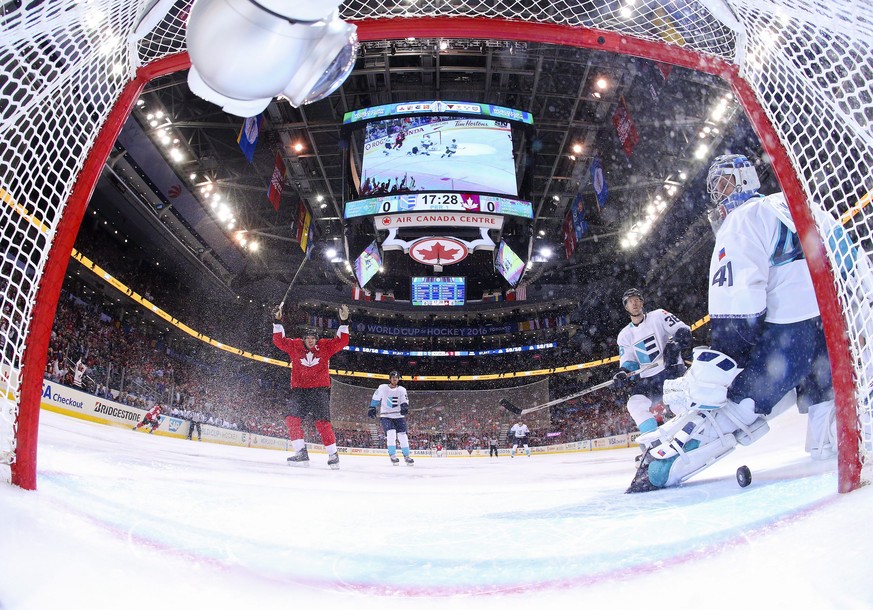 Europe goalie Jaroslav Halak (41) looks back after allowing a goal as Canada&#039;s Sidney Crosby (87) celebrates during the first period of Game 1 of the World Cup of Hockey finals, Tuesday, Sept. 27 ...