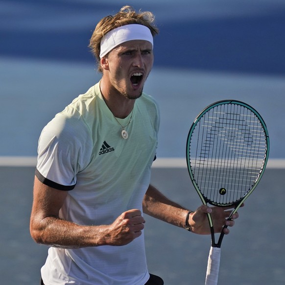 Alexander Zverev, of Germany, reacts while playing against Nikoloz Basilashvili, of Georgia, during the third round of the tennis competition at the 2020 Summer Olympics, Wednesday, July 28, 2021, in  ...