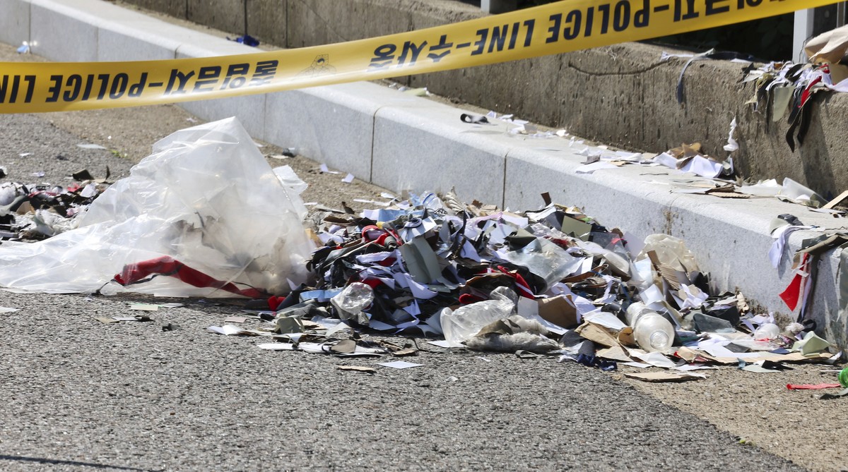 The trash from a balloon presumably sent by North Korea, is seen behind police tape in Incheon, South Korea, Sunday, June 2, 2024. North Korea launched hundreds of more trash-carrying balloons toward  ...
