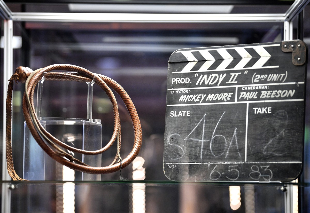 epa07000528 A whip and a clapperboard from the film Indiana Jones and the Temple of Doom at a media preview for at television and film memorabilia auction by Prop Store. in London, Britain, 06 Septemb ...